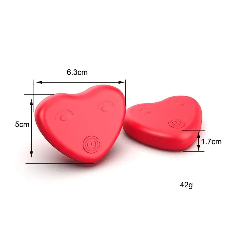 Red heart-shaped dog toy for puppy anxiety relief, dimensions 6.3cm x 5cm, weight 42g.