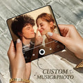 Custom music and photo fridge magnet featuring a couple enjoying a moment together with a playful design.