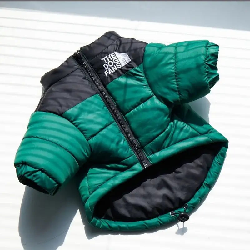 Warm green and black dog jacket with a zipper, perfect for winter outdoor activities.