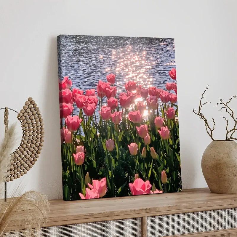 Framed canvas poster of pink flowers by water, perfect home wall decor for living room or office.