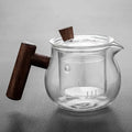 450ml heat resistant glass teapot with wooden handle, ideal for brewing flower tea.