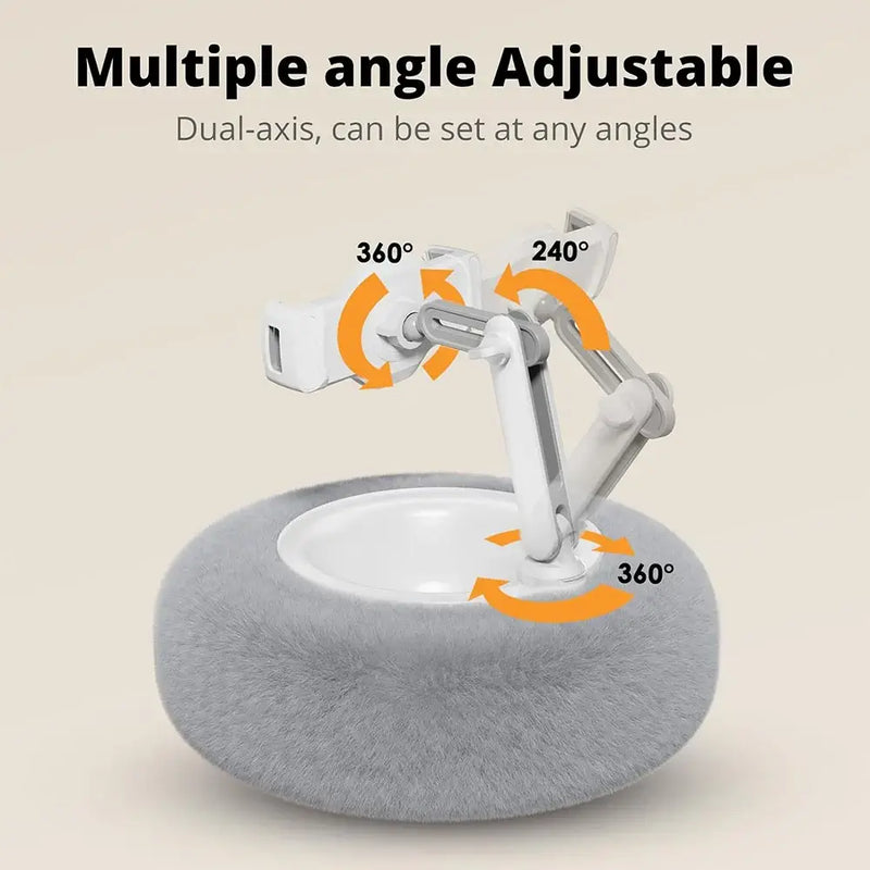 Adjustable dual-axis holder with multiple angles for tablets and phones, featuring a soft, washable pillow base.