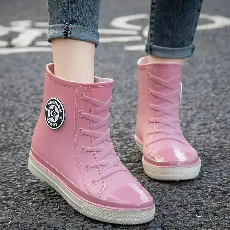 Pink high top rain boots for women, soft sole, waterproof, stylish slip-on design, perfect for garden and kitchen work.