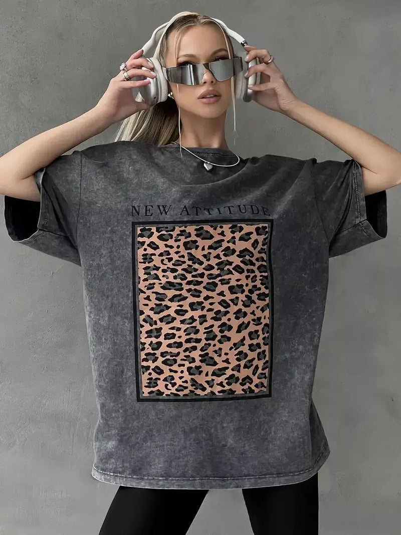 Oversized cotton t-shirt for women with leopard print and 'New Attitude' text, styled for a trendy summer look.