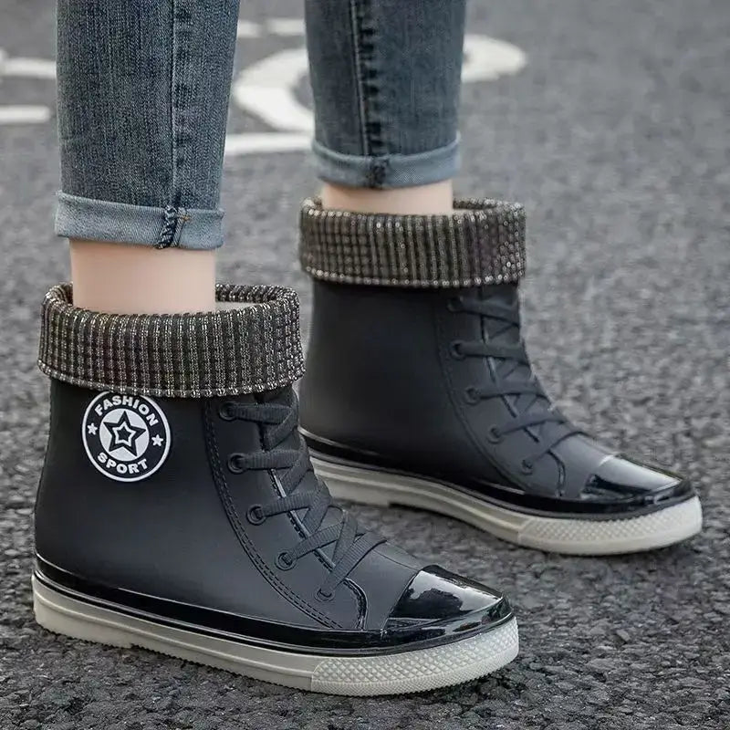 Stylish women's black high top rain boots with detachable knit collar and slip-on design, ideal for kitchen and garden work.