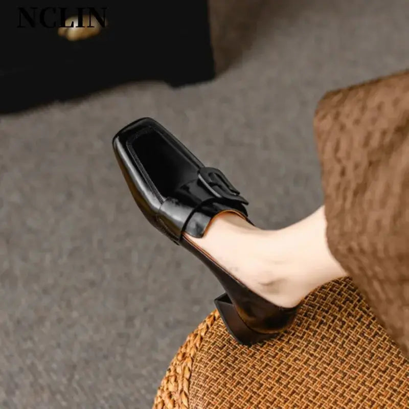 Elegant black chunky heel loafers for women with square toe and belt buckle, perfect for spring and autumn.