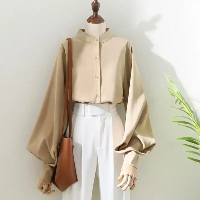 Spring autumn women's blouse shirt with long lantern sleeves and stand collar in beige, casual loose fit style.