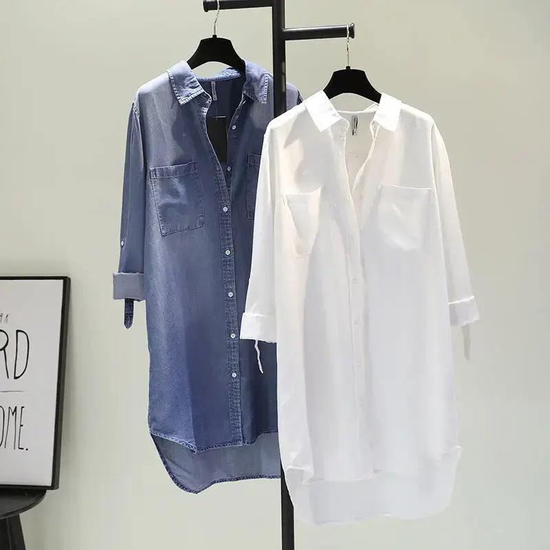 Two stylish denim shirt dresses for women, one blue and one white, featuring rolled sleeves and double pockets.