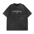 Oversized black cotton T-shirt with 'STRESSLESS' graphic print for casual style.