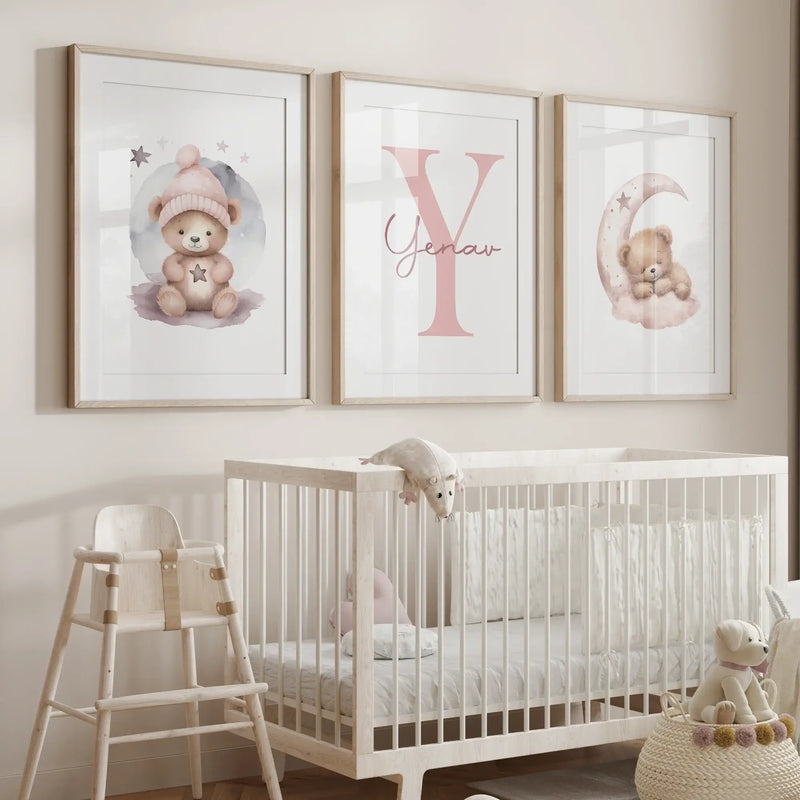 Pink sleeping bear wall art prints personalized name for kids' room decor, featuring soft colors and playful designs.