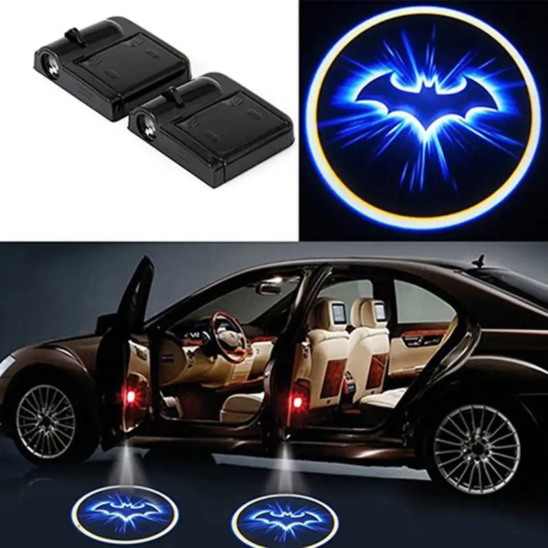 Wireless bat logo LED projector lamps illuminating a car's interior with a stylish glow.