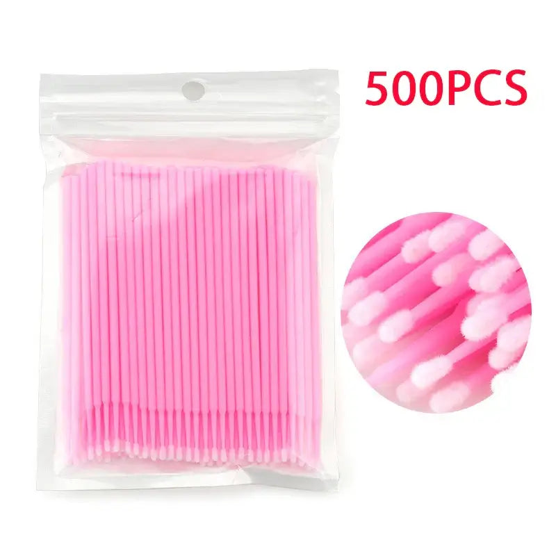 500pcs disposable mascara wands in clear packaging, perfect for eyelash extension and makeup applications.