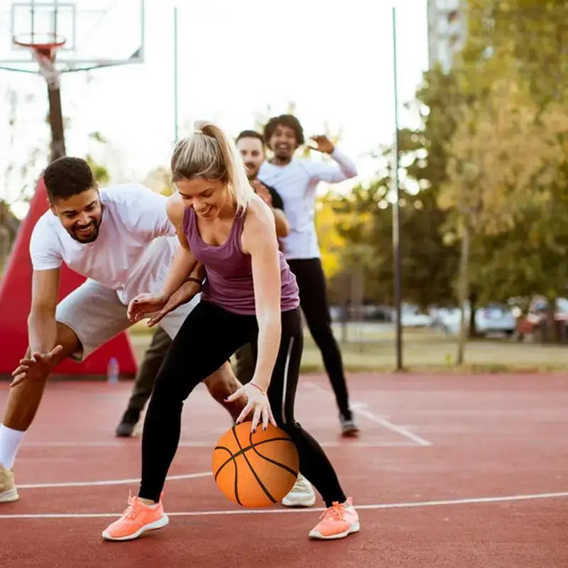 Kids practicing basketball skills on a court, featuring a girl dribbling a ball with friends cheering her on.