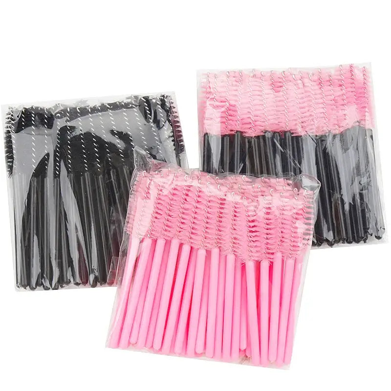 50 Pcs disposable mini eyelash brushes in black and pink packaging for makeup application.