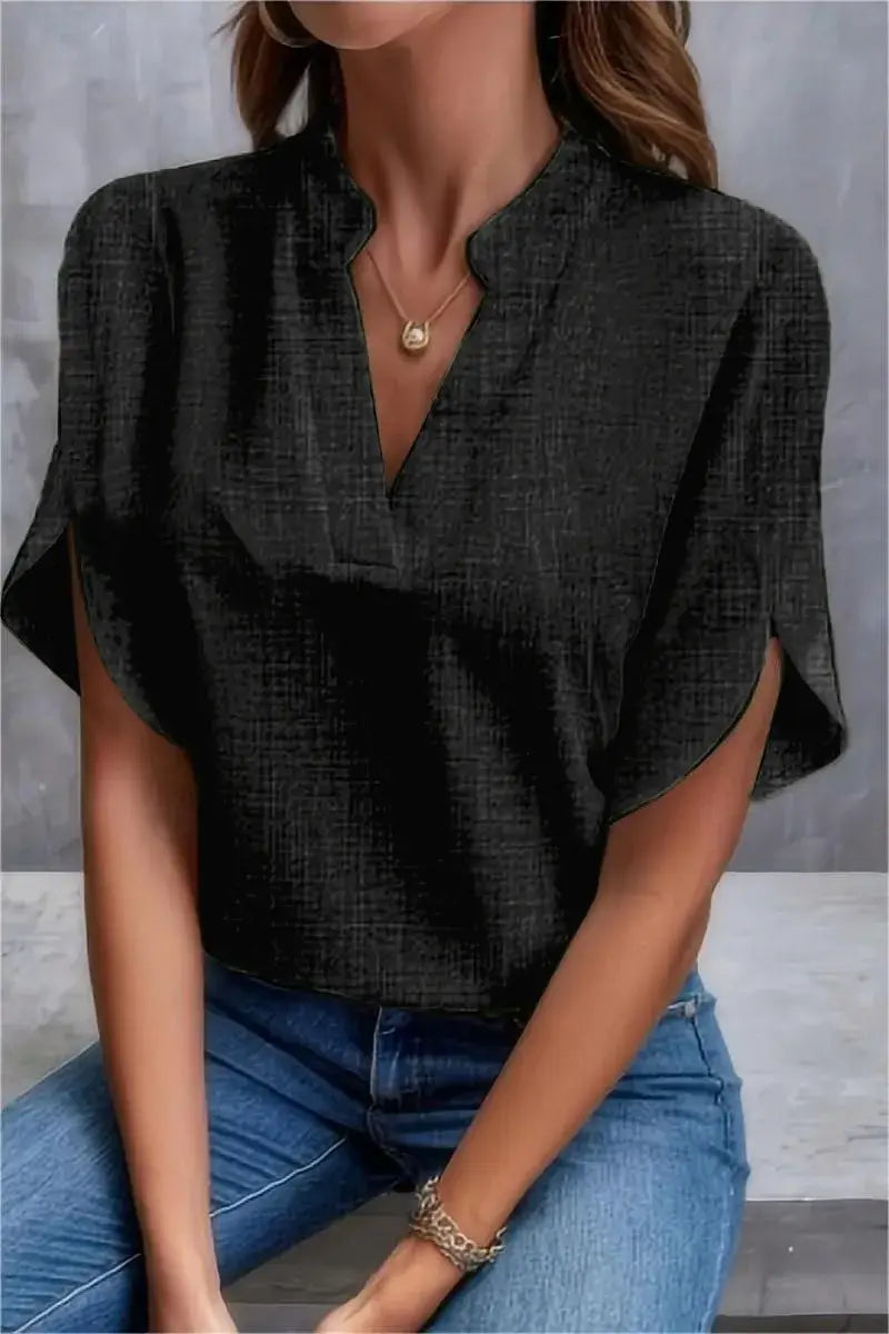 Casual women's black V-neck blouse in cotton linen for summer, perfect for elegant office wear.