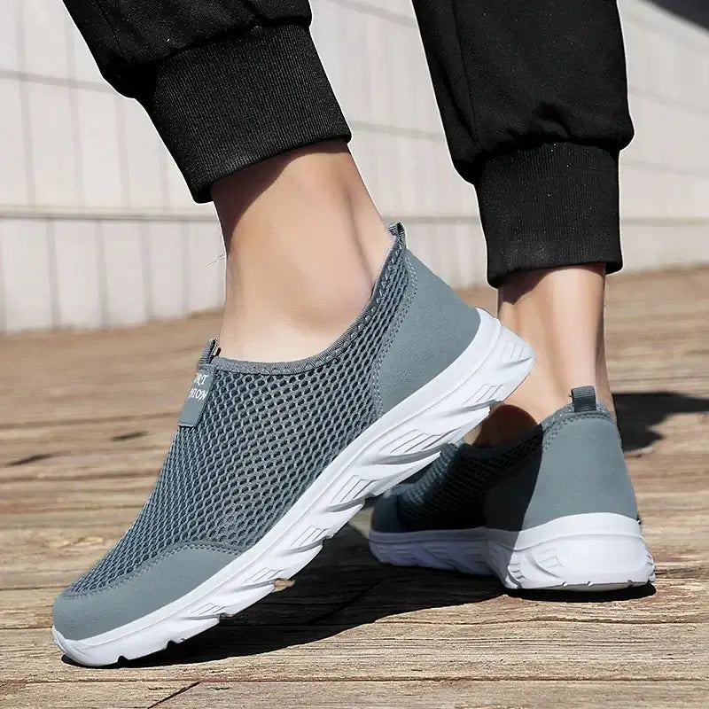 Men's breathable mesh slip-on sneakers, perfect for summer outdoor activities, offering comfort and non-slip support.