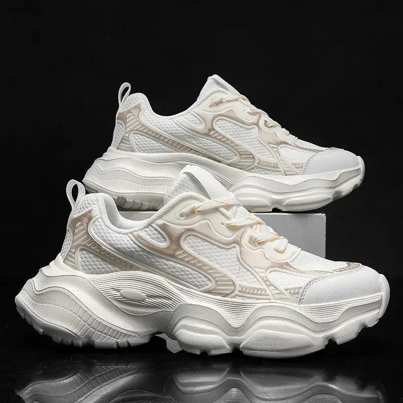 White breathable men's sneakers with lace-up closure and stylish design, ideal for casual wear and summer activities.