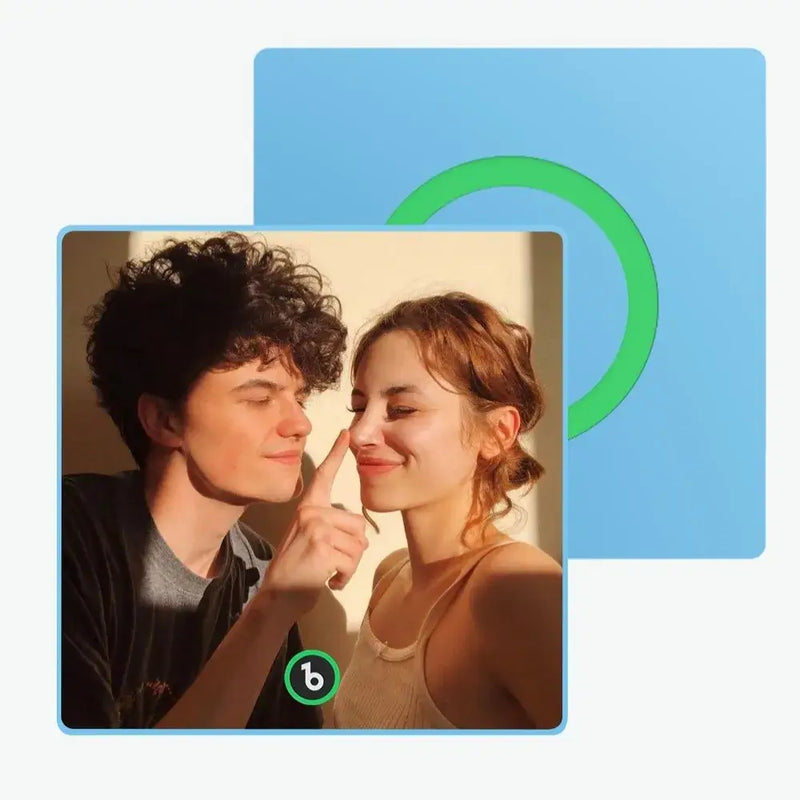 Couple enjoying a playful moment together with personalized Fridgebeats™ music fridge magnets.