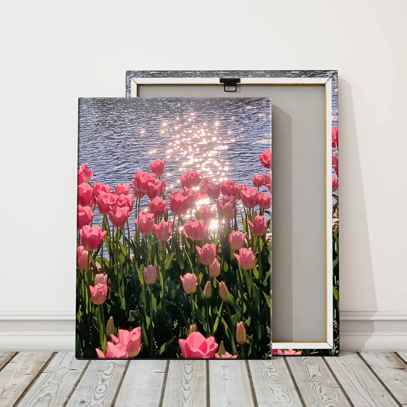 Framed canvas poster of pink tulips by water, perfect wall decor for living room, bedroom, or restaurant.