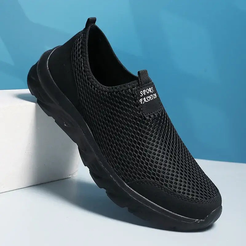 Men's breathable black mesh slip-on sneakers ideal for summer outdoor use, featuring a non-slip sole and lightweight design.