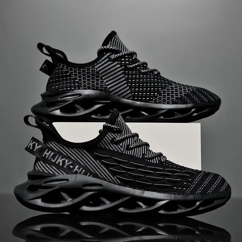 Men's breathable luxury casual sneakers in black with race mesh design for summer running and daily wear.