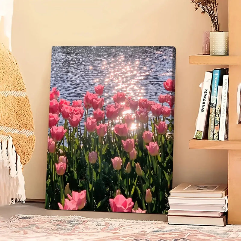 Framed canvas poster of pink flowers by a sparkling water surface, ideal for home, office, and restaurant decor.