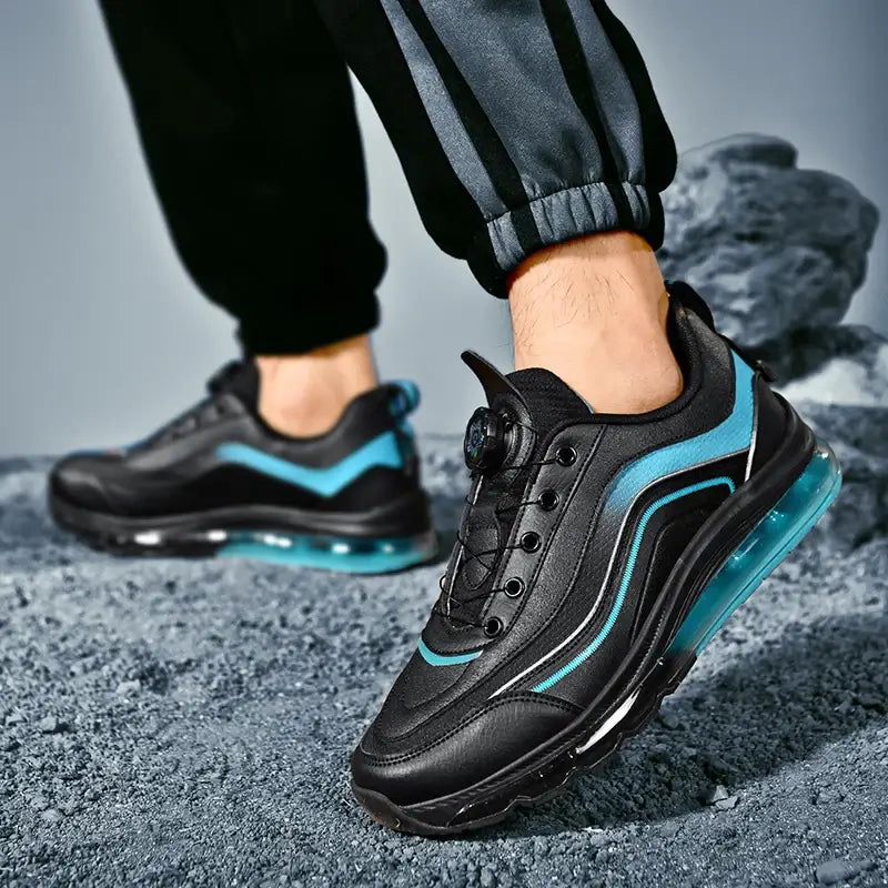 Men's breathable luxury sneakers in black and teal, featuring a lace-up closure and cushioned air sole.