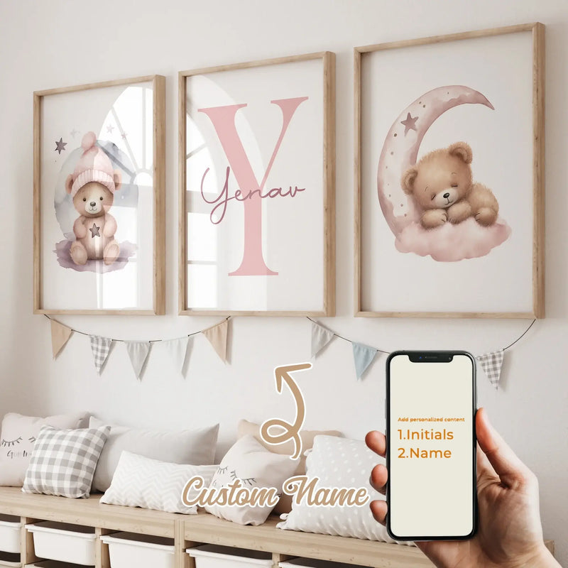 Personalized kids wall art with pink sleeping bear, custom name, and initials in a stylish living room setting.